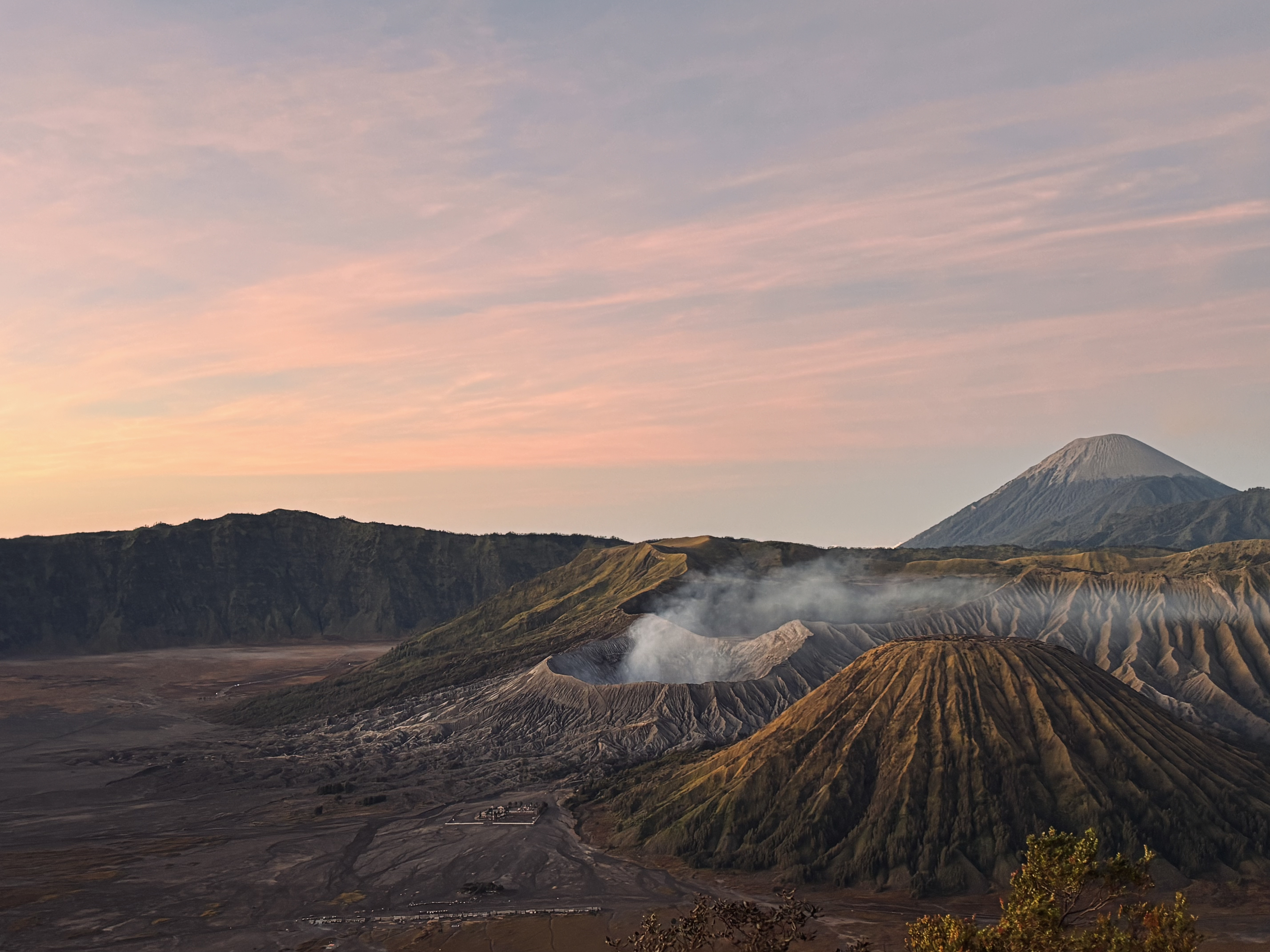 A private group looking out over the Bromo caldera at sunrise