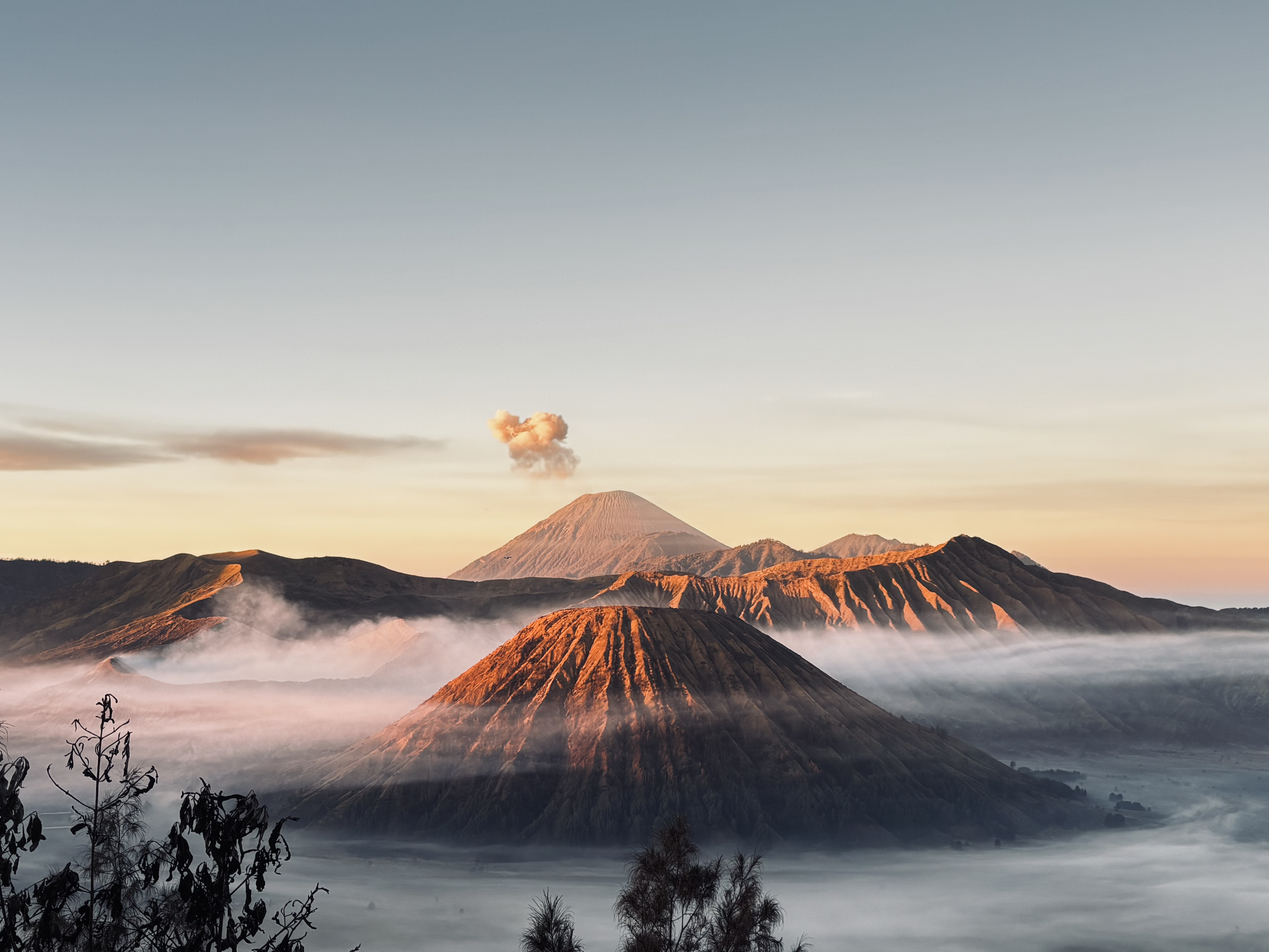 A private group looking out over the Bromo caldera at sunrise